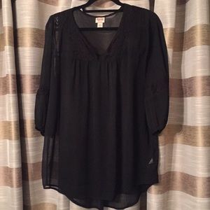 Sheer black top with lace detail